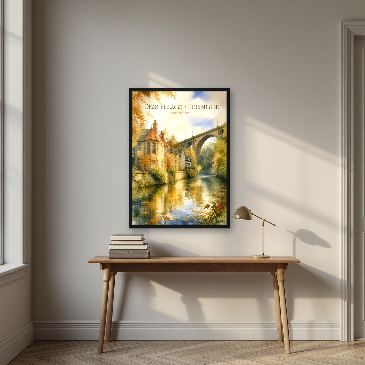Dean Village — Edinburgh art print, in a black frame, styled in a desk
