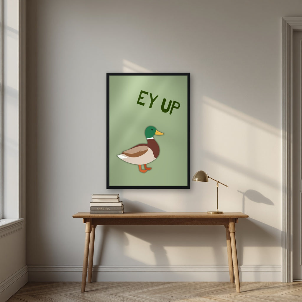 Ey Up Duck – Allotment Sage art print in a black frame, styled above a desk