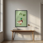 Ey Up Duck – Allotment Sage art print in a black frame, styled above a desk