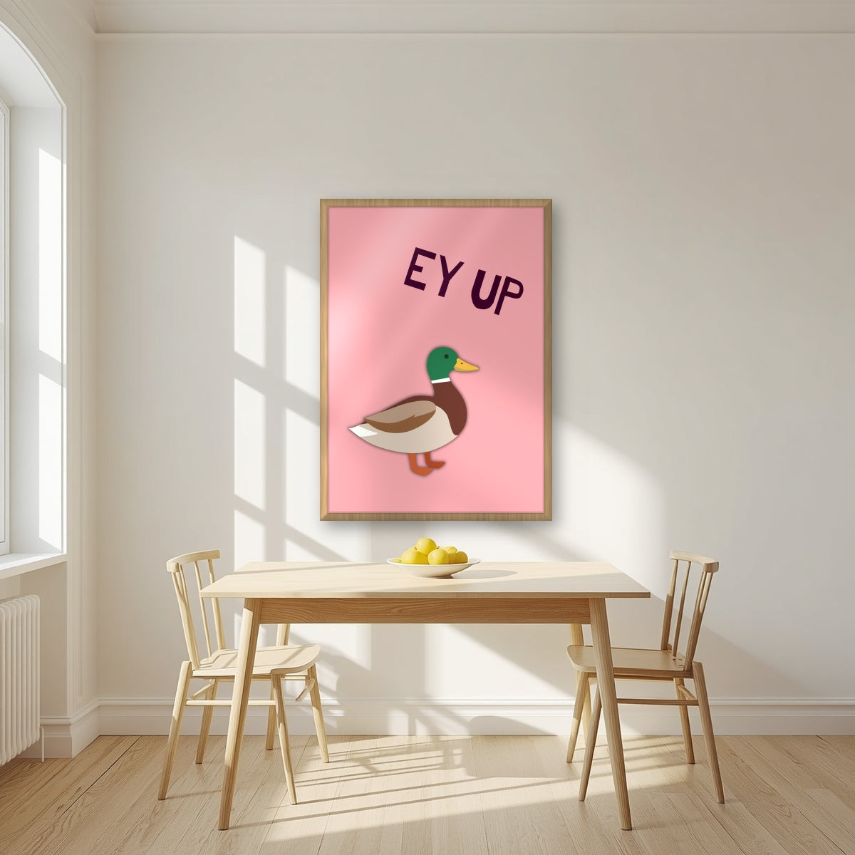 Ey Up Duck – Candyfloss Pink art print in an oak frame, styled in a kitchen