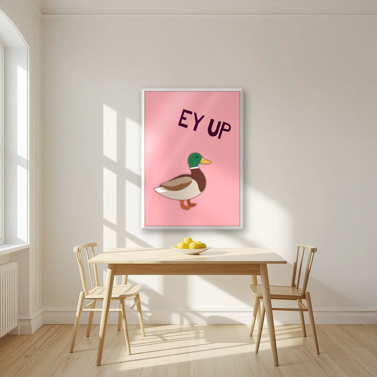 Ey Up Duck – Candyfloss Pink art print in a white frame, styled in a kitchen