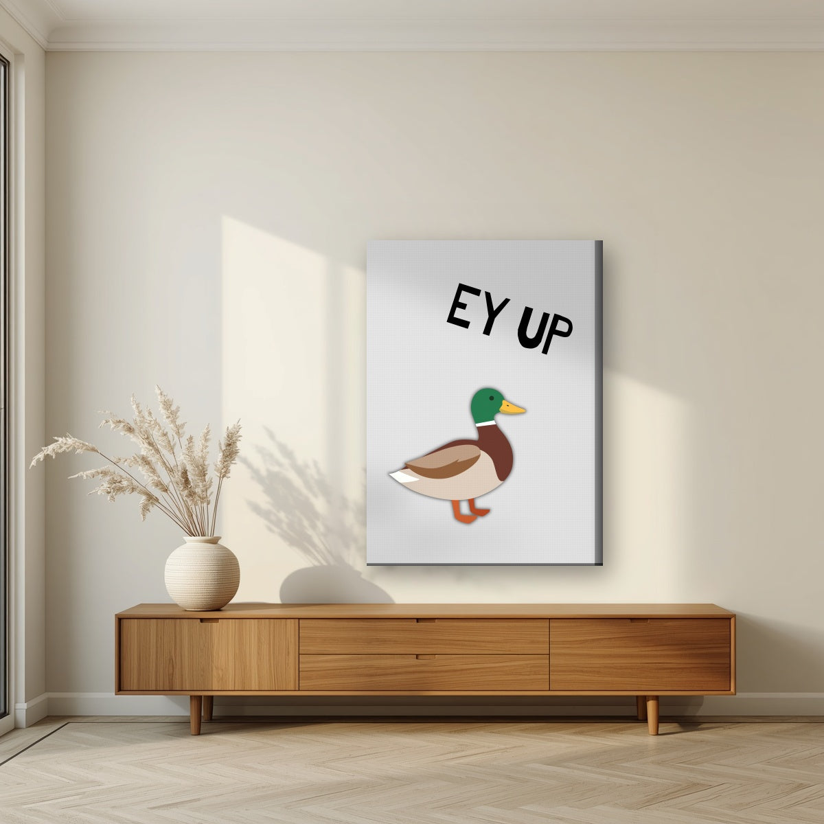 Ey Up Duck – Drizzle Grey art print on slim canvas, styled in a living room