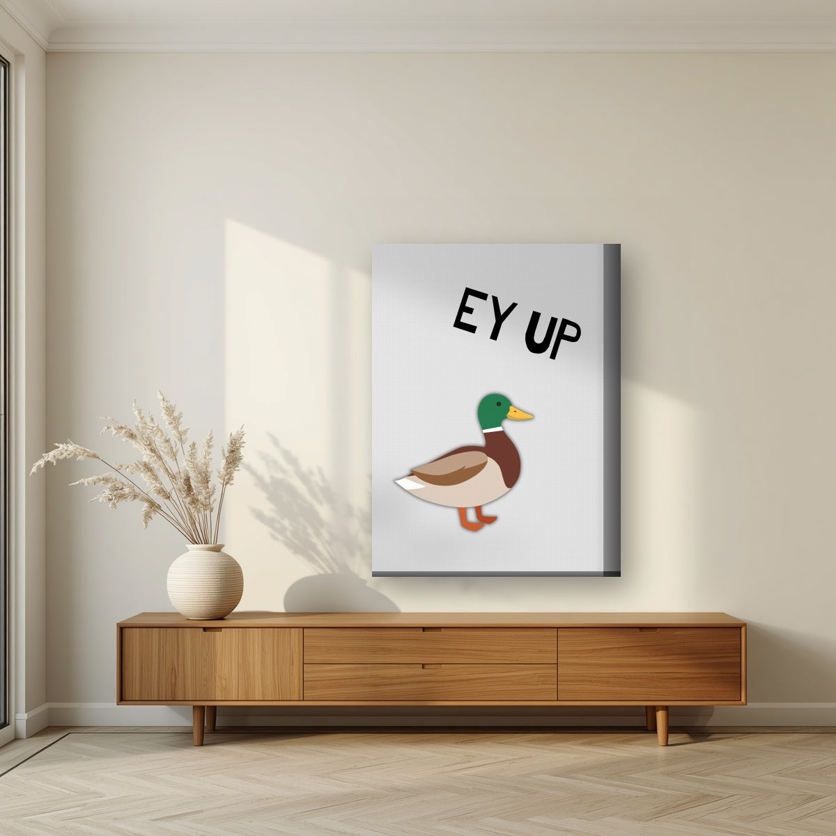 Ey Up Duck – Drizzle Grey art print on thick canvas, styled in a living room