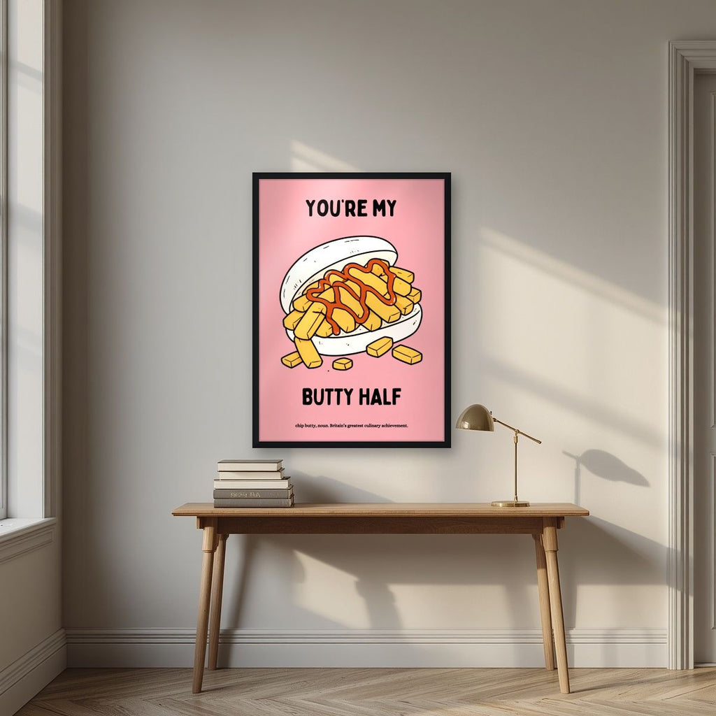 You're My Butty Half – Candyfloss Pink art print, in a black frame, styled in a desk