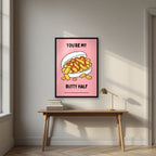 You're My Butty Half – Candyfloss Pink art print, in a black frame, styled in a desk