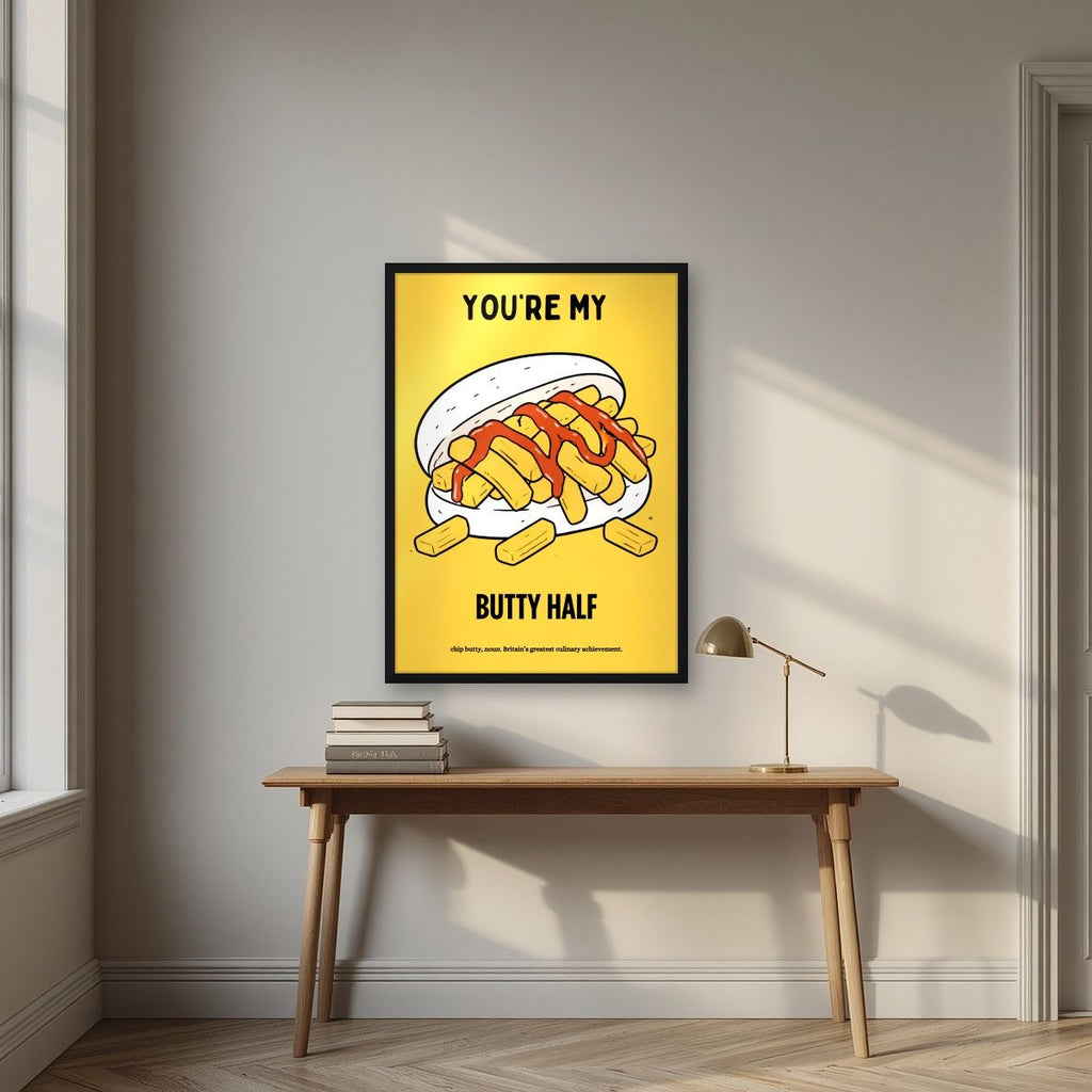 You're My Butty Half – Chippy Gold art print, in a black frame, styled in a desk