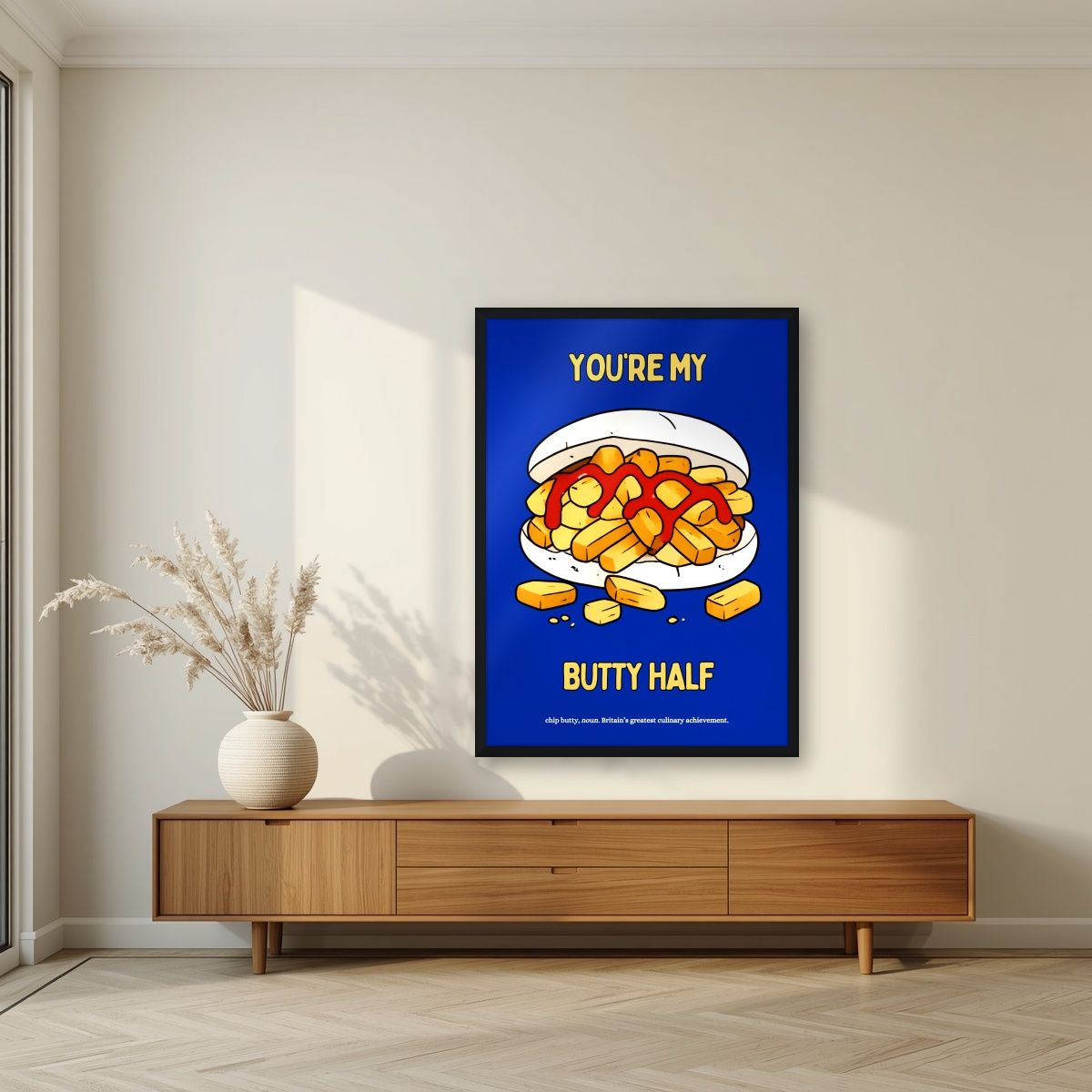 You're My Butty Half – Deckchair Blue art print, in a black frame, styled in a living room