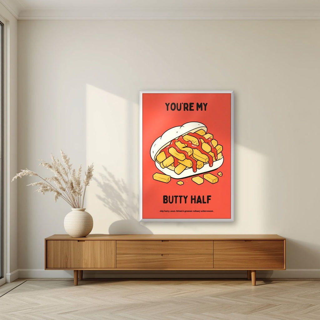 You're My Butty Half – Ketchup Coral art print, in a white frame, styled in a living room