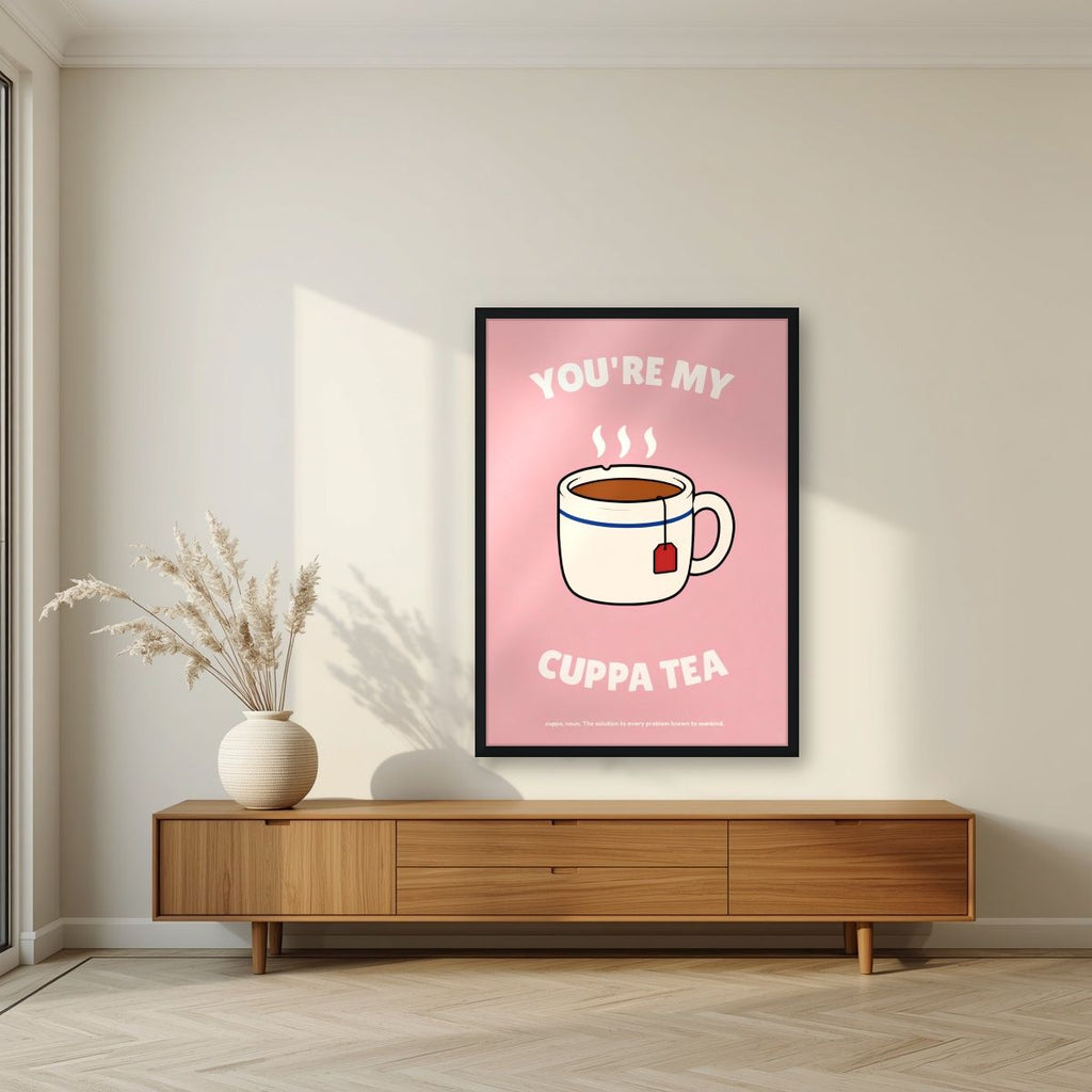 You're My Cuppa Tea – Battenberg Pink art print, in a black frame, styled in a living room