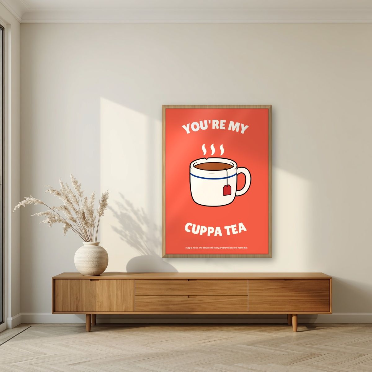 You're My Cuppa Tea – Postbox Coral art print, in an oak frame, styled in a living room