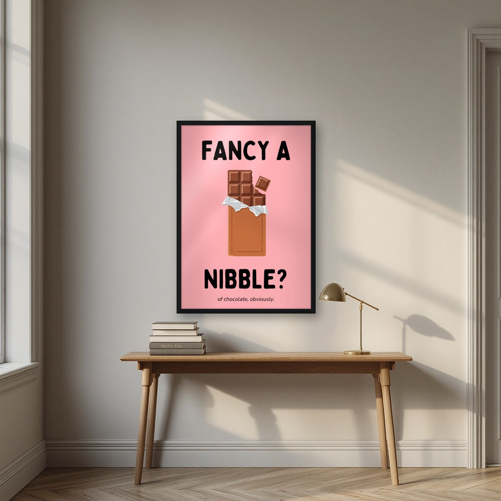 Fancy a Nibble – Candyfloss Pink art print, in a black frame, styled in a desk