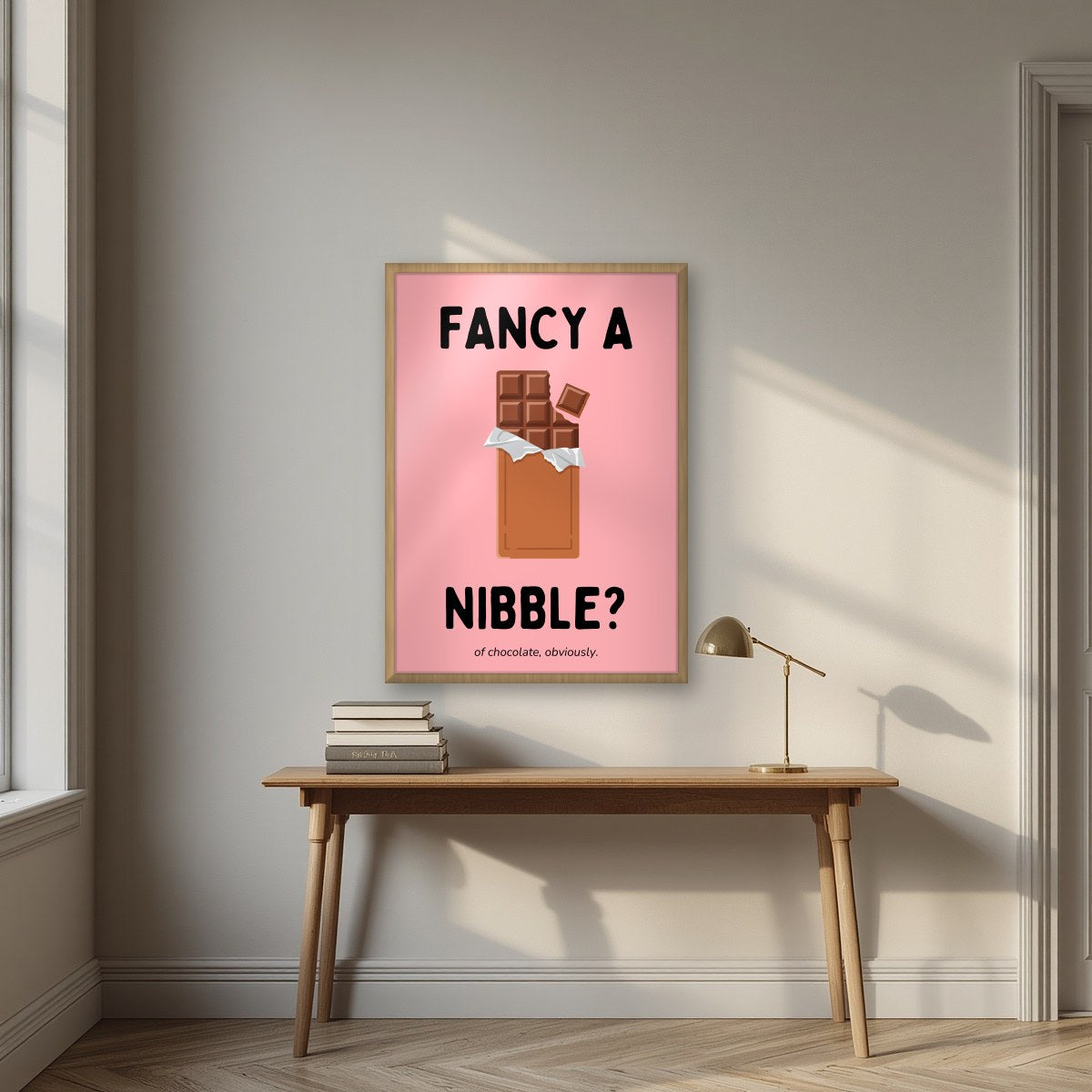 Fancy a Nibble – Candyfloss Pink art print, in an oak frame, styled in a desk