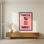 Fancy a Nibble – Candyfloss Pink art print, in a black frame, styled in a living room