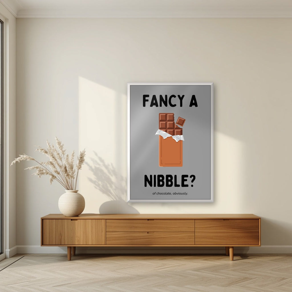 Fancy a Nibble – Pebble Grey art print, in a white frame, styled in a living room