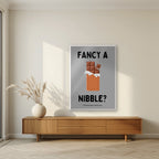 Fancy a Nibble – Pebble Grey art print, in a white frame, styled in a living room