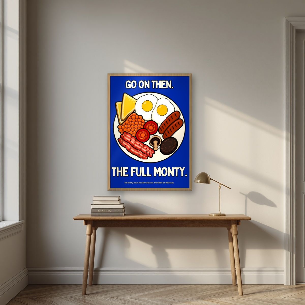 The Full Monty – Britannia Blue art print, in an oak frame, styled in a desk