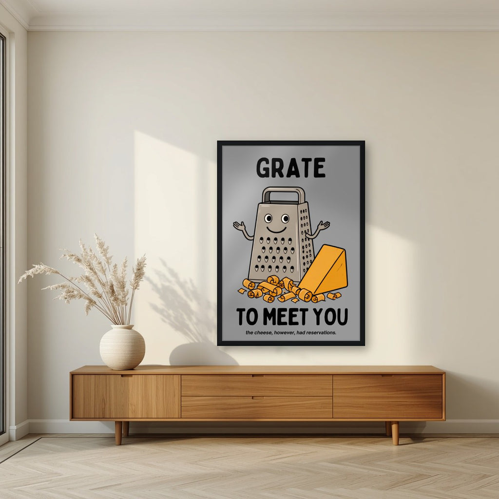 Grate to Meet You – Pebble Grey art print, in a black frame, styled in a living room