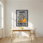Grate to Meet You – Pebble Grey art print, in a black frame, styled in a kitchen