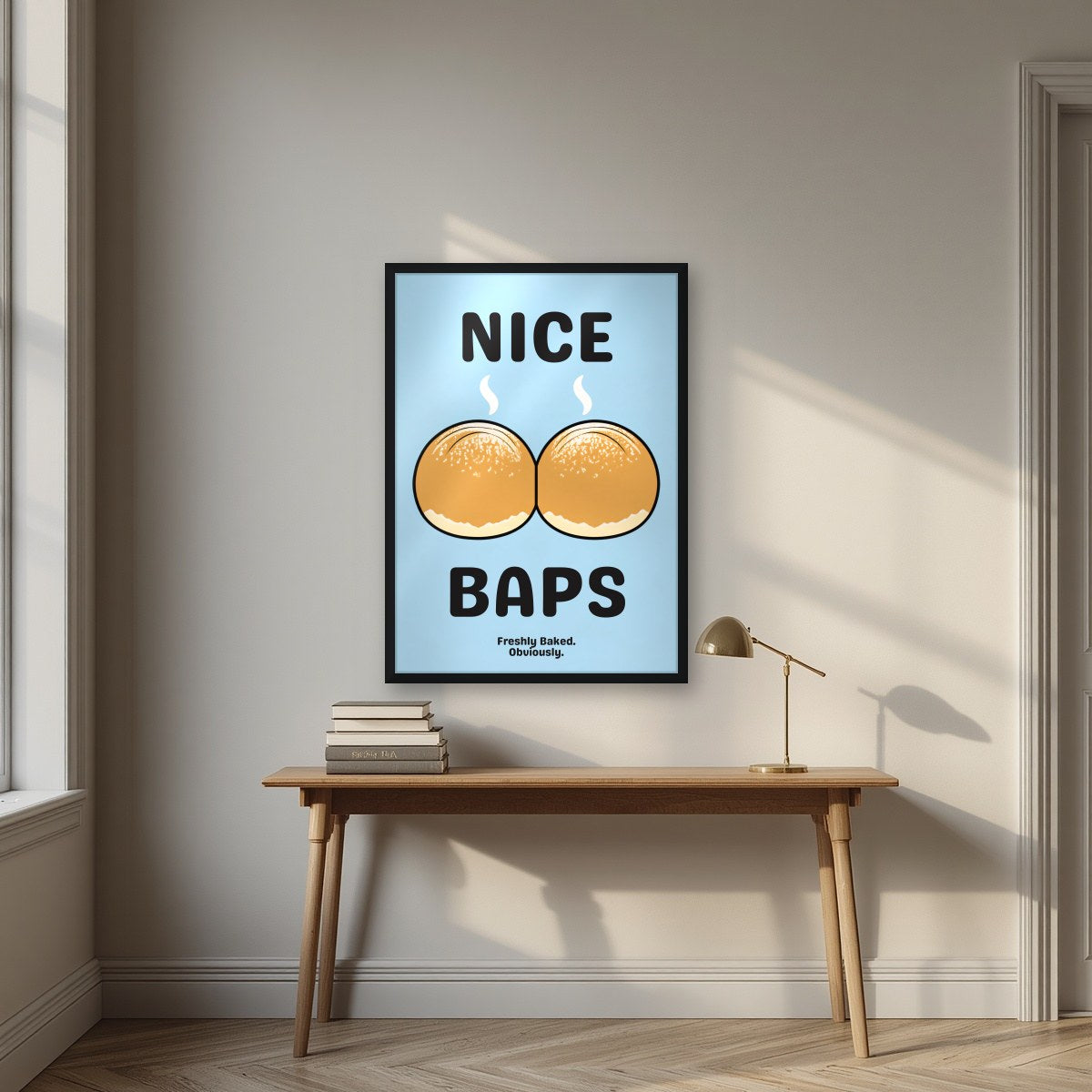 Nice Baps – Deckchair Blue art print, in a black frame, styled in a desk