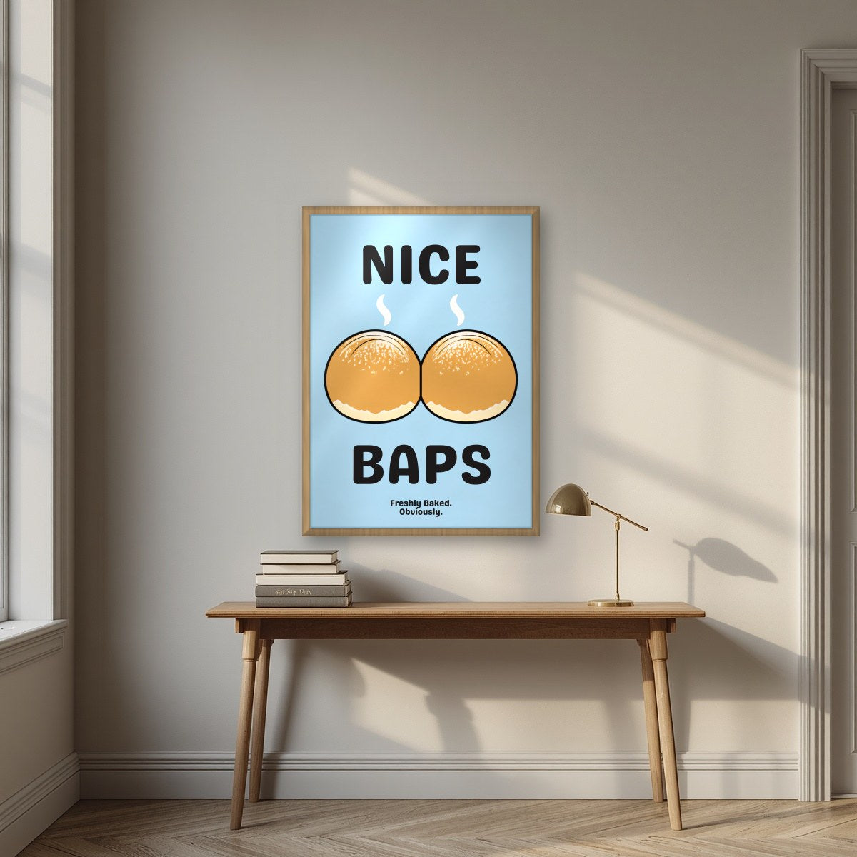 Nice Baps – Deckchair Blue art print, in an oak frame, styled in a desk