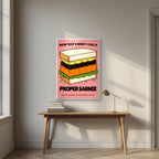 Now That's What I Call a Proper Sarnie – Battenberg Pink art print, in a white frame, styled in a desk