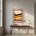 Now That's What I Call a Proper Sarnie – Battenberg Pink art print, in an oak frame, styled in a desk