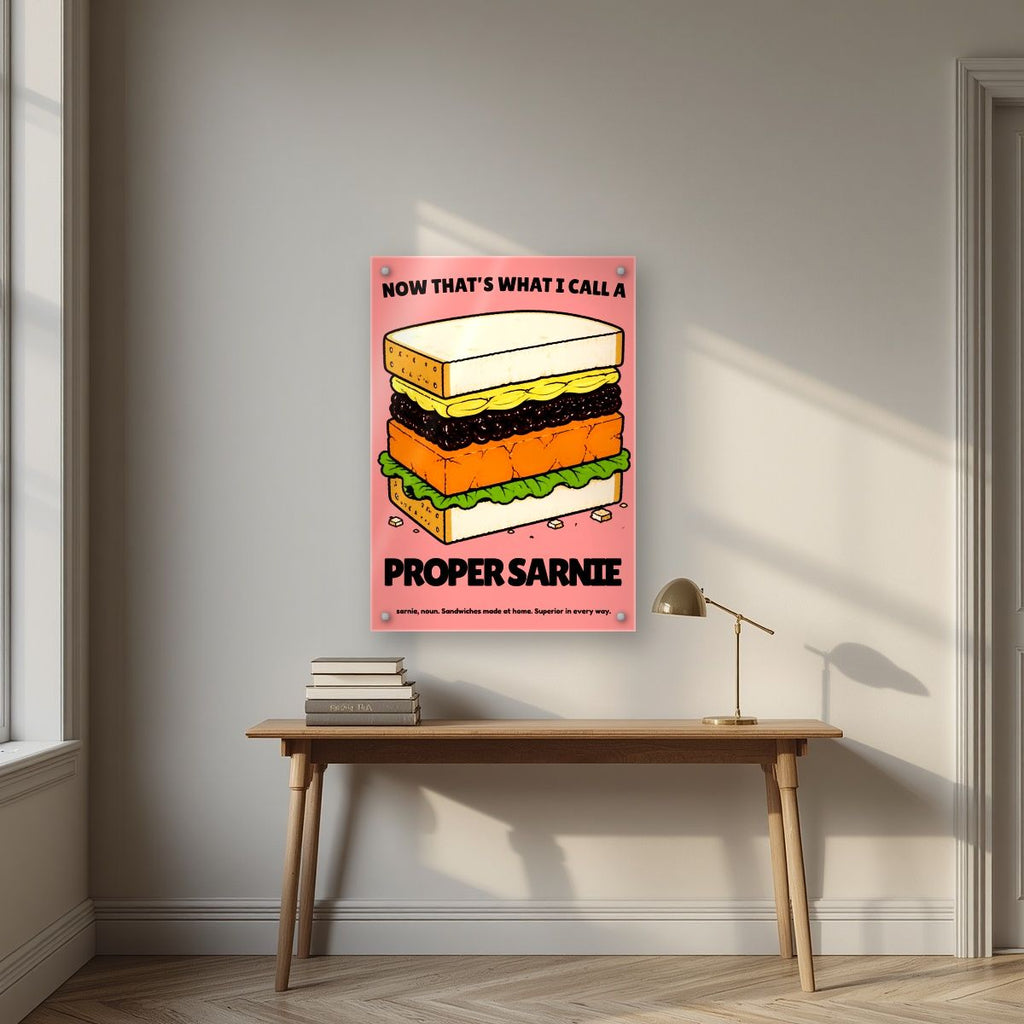 Now That's What I Call a Proper Sarnie – Battenberg Pink art print, as an acrylic print, styled in a desk