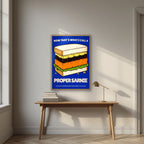 Now That's What I Call a Proper Sarnie – Deckchair Navy art print, in an oak frame, styled in a desk