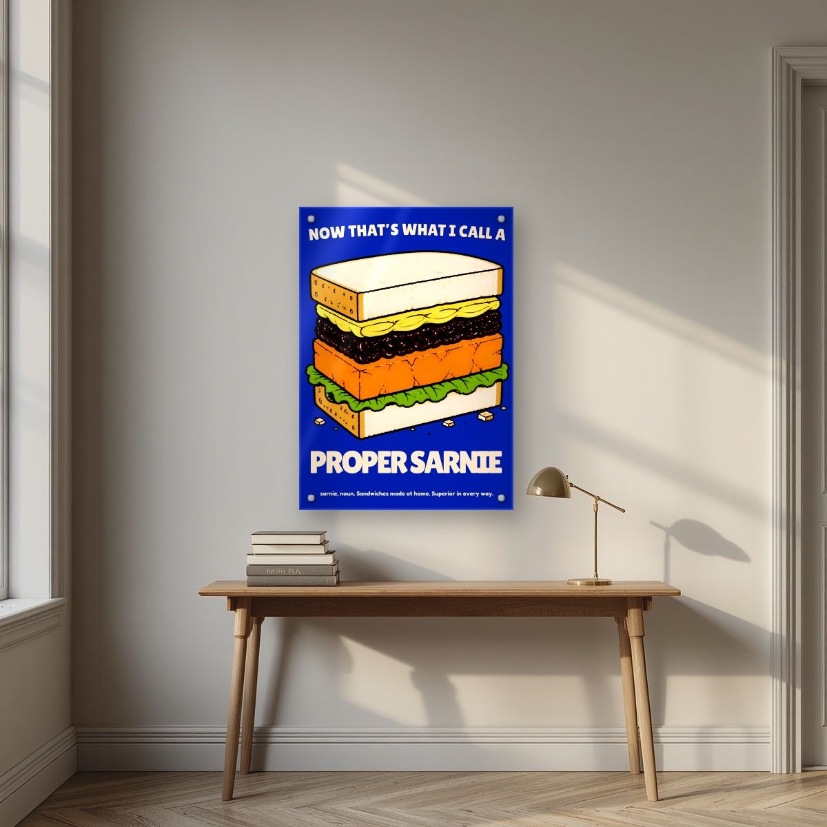 Now That's What I Call a Proper Sarnie – Deckchair Navy art print, as an acrylic print, styled in a desk