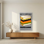 Now That's What I Call a Proper Sarnie – Drizzle Grey art print, in a white frame, styled in a living room