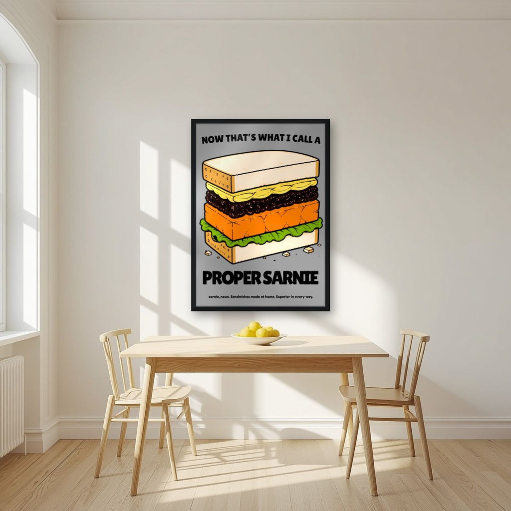 Now That's What I Call a Proper Sarnie – Drizzle Grey art print, in a black frame, styled in a kitchen