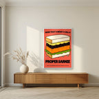 Now That's What I Call a Proper Sarnie – Ketchup Coral art print, in a white frame, styled in a living room