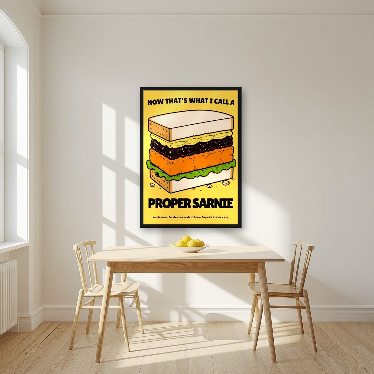 Now That's What I Call a Proper Sarnie – Piccalilli art print, in a black frame, styled in a kitchen