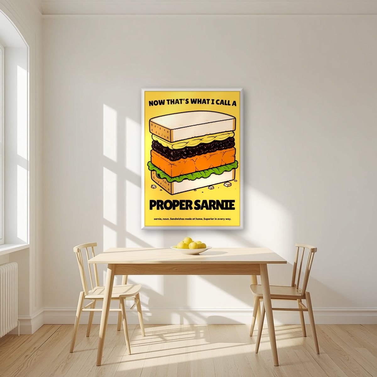 Now That's What I Call a Proper Sarnie – Piccalilli art print, in a white frame, styled in a kitchen