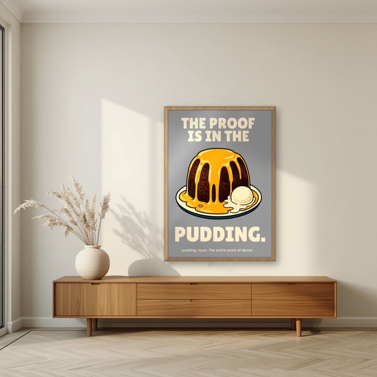 The Proof Is In The Pudding – Cobblestone Grey art print, in an oak frame, styled in a living room