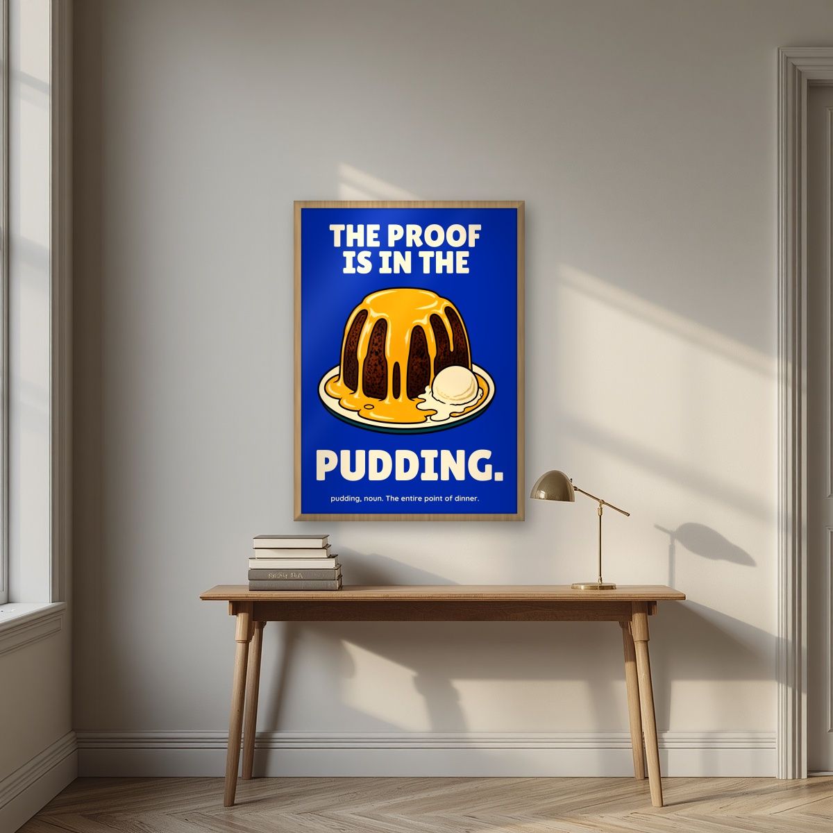 The Proof Is In The Pudding – Inkwell Blue art print, in an oak frame, styled in a desk