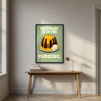 The Proof Is In The Pudding – Orchard Sage art print, in a black frame, styled in a desk