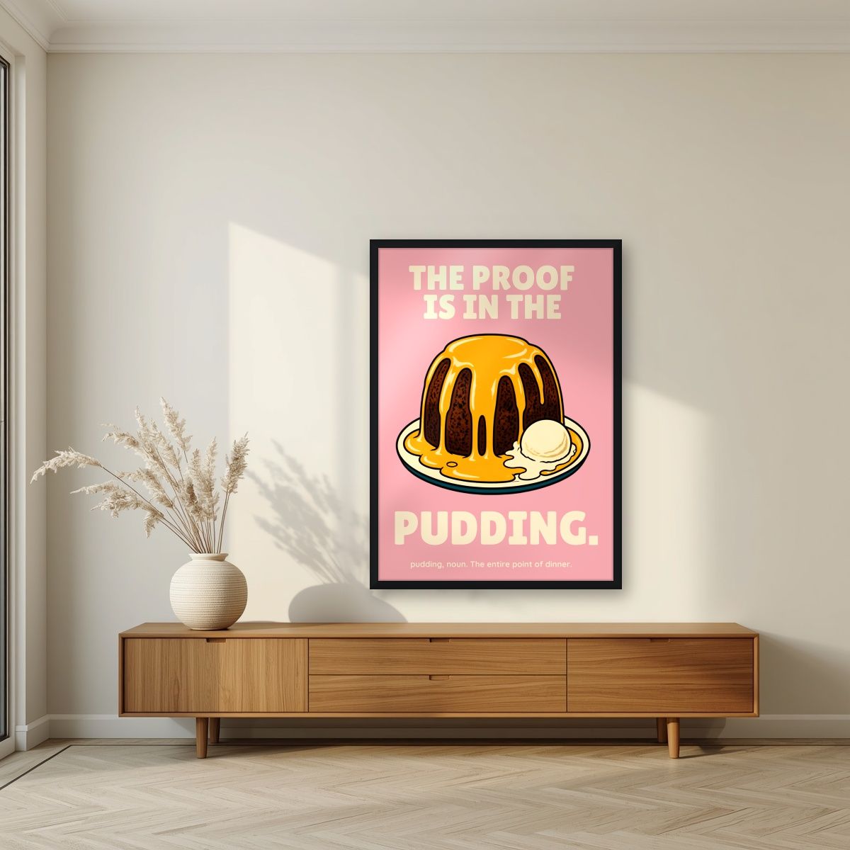 The Proof Is In The Pudding – Positano Pink art print, in a black frame, styled in a living room
