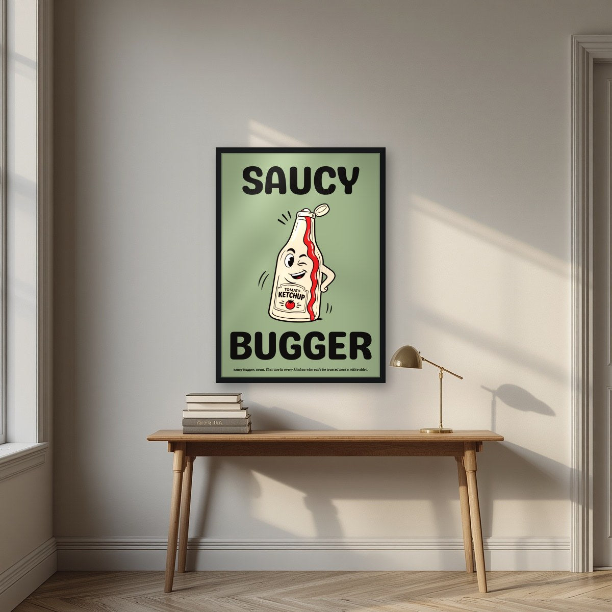 Saucy Bugger – Allotment Sage art print, in a black frame, styled in a desk