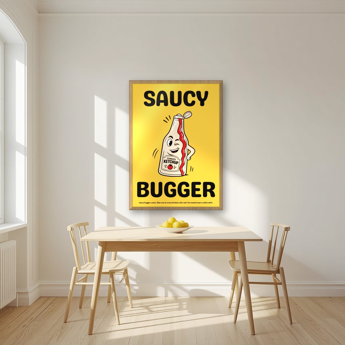 Saucy Bugger – Chippy Gold art print, in an oak frame, styled in a kitchen