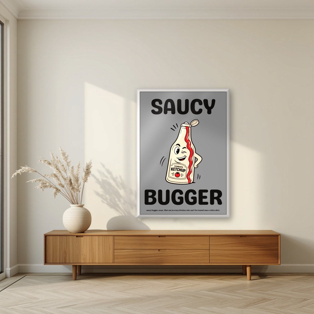 Saucy Bugger – Pebble Grey art print, in a white frame, styled in a living room