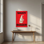 Saucy Bugger – Postbox Red art print, unframed poster, styled in a desk