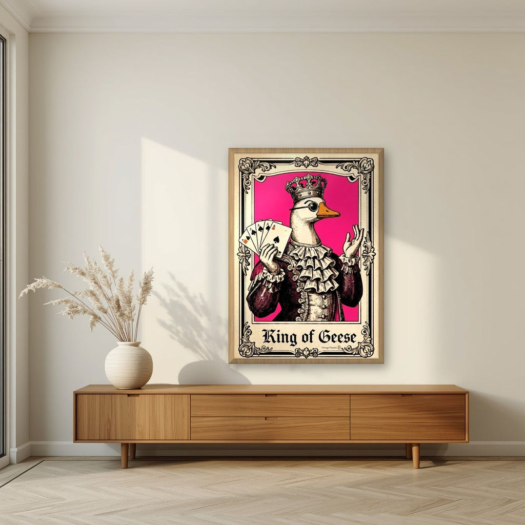 King of Geese – Jester Pink art print, in an oak frame, styled in a living room