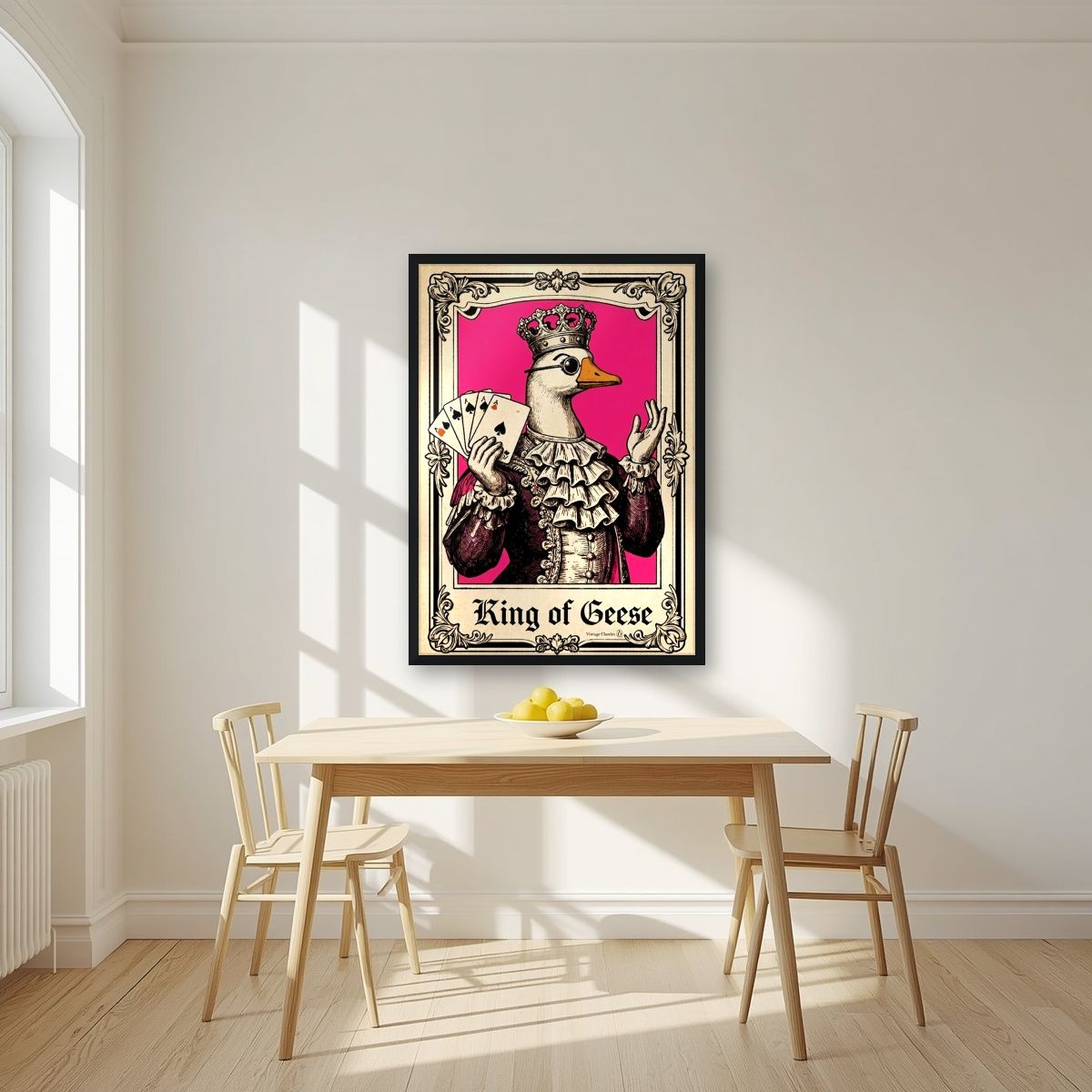 King of Geese – Jester Pink art print, in a black frame, styled in a kitchen