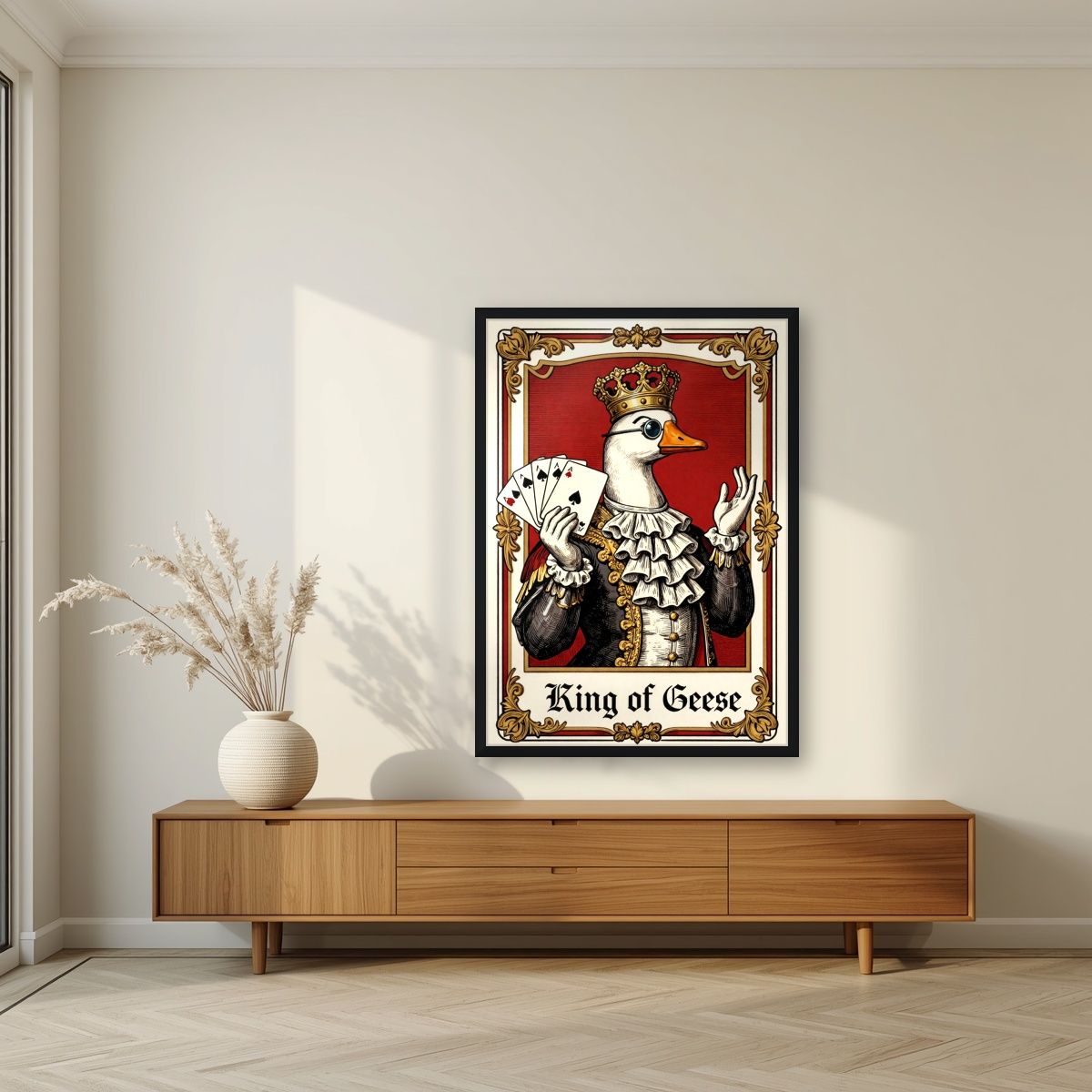 King of Geese – Regal Crimson art print, in a black frame, styled in a living room