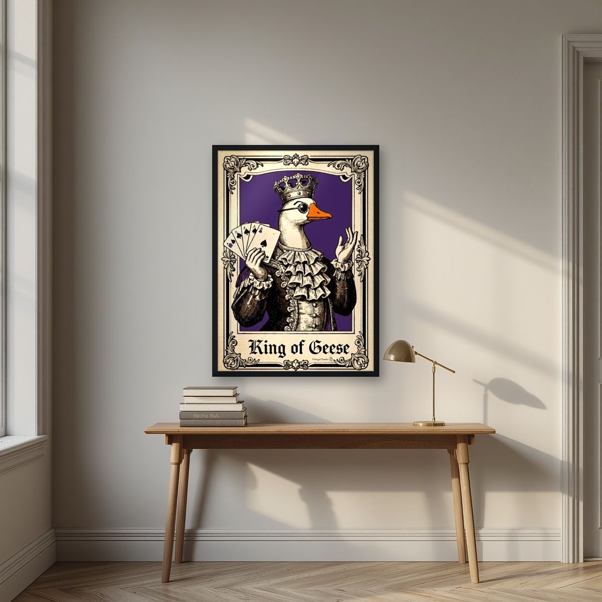 King of Geese – Sovereign Purple art print, in a black frame, styled in a desk
