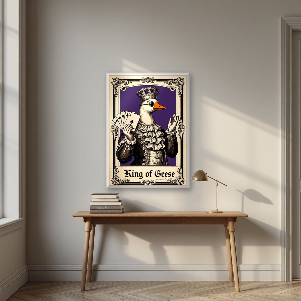 King of Geese – Sovereign Purple art print, in a white frame, styled in a desk