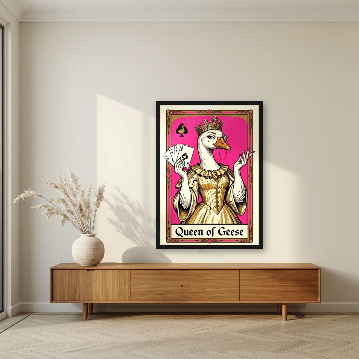 Queen of Geese – Fuchsia Flush art print, in a black frame, styled in a living room