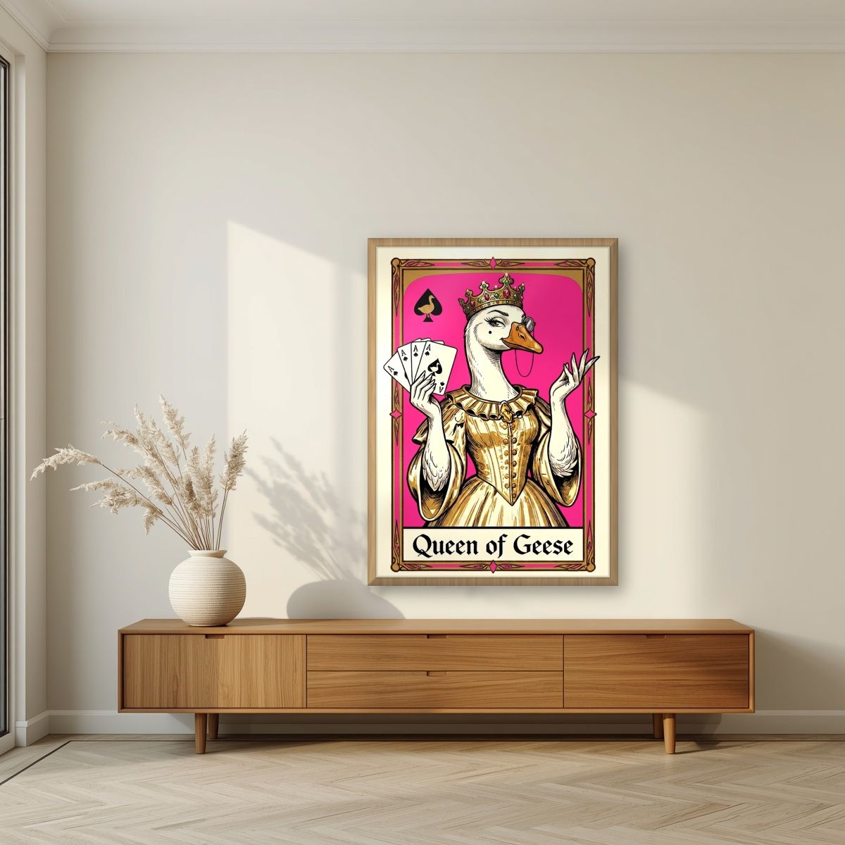 Queen of Geese – Fuchsia Flush art print, in an oak frame, styled in a living room