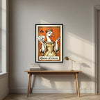 Queen of Geese – Tangerine Throne art print, in a black frame, styled in a desk